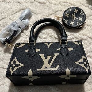 Gorgeous black and tan top handle with crossbody and coin purse!